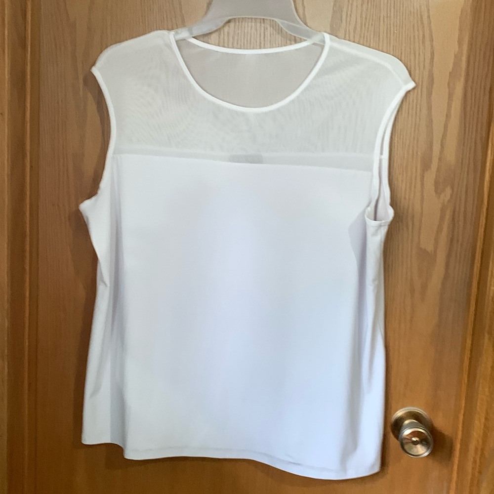 Sleeveless top - upper part is mesh - lower part silky t-shirt material